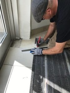 Replace broken floor tiles.